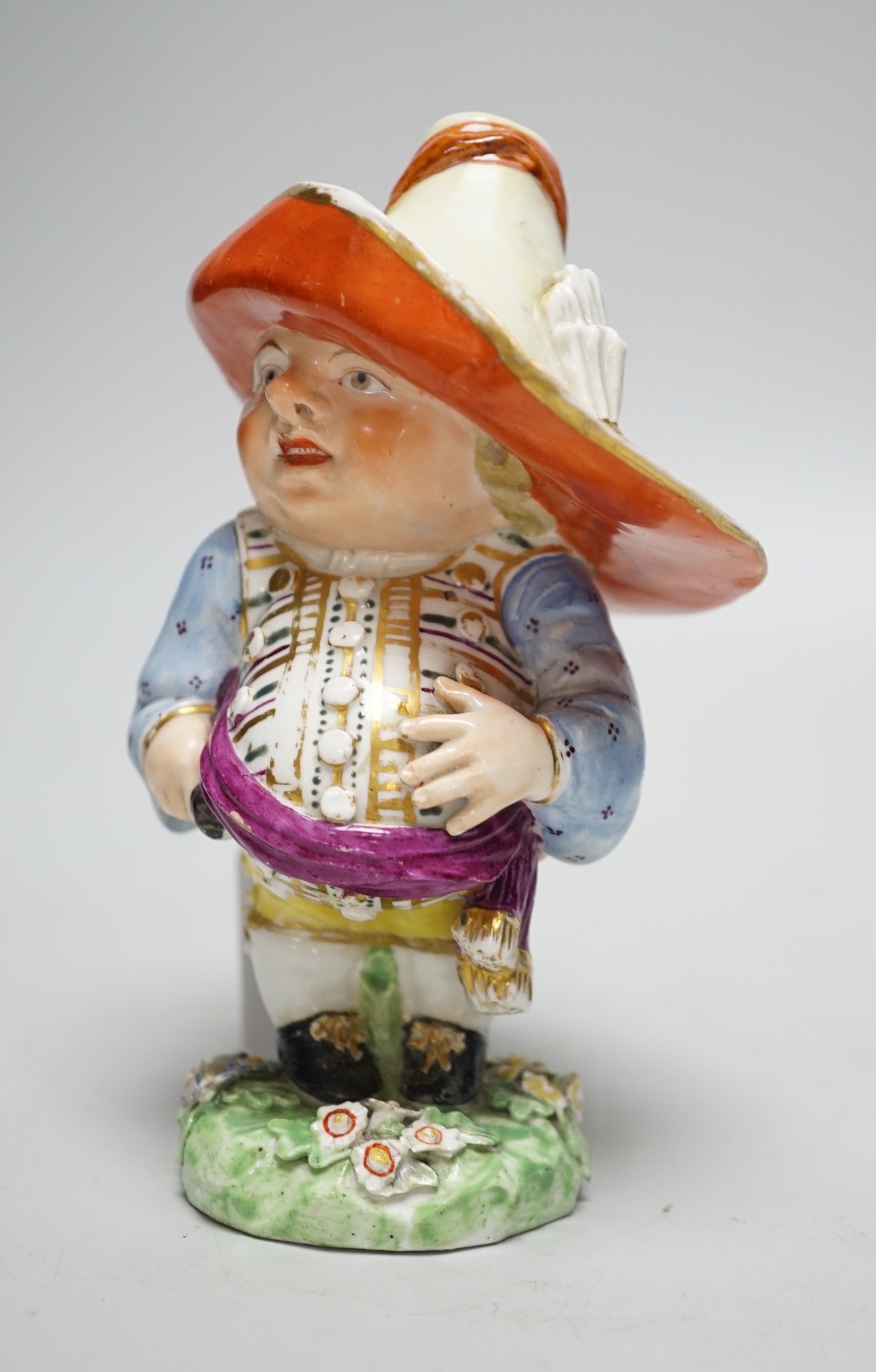 A Derby Mansion House Dwarf holding his large belly incised 227, star mark for Issac Farnsworth c.1790-1800, 17cms high